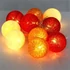 Kép 3/3 - Iris Gömb alakú 6cm/színes fonott/1,5m/piros-narancs-meleg fehér/10db LED-es/USB-s fénydekoráció
